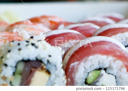Indulge in Delicious Sushi Rolls that are Prepared with Only the Freshest Ingredients Indulge in Delicious Sushi Rolls that are Prepared with Only the Freshest Ingredients 125171796