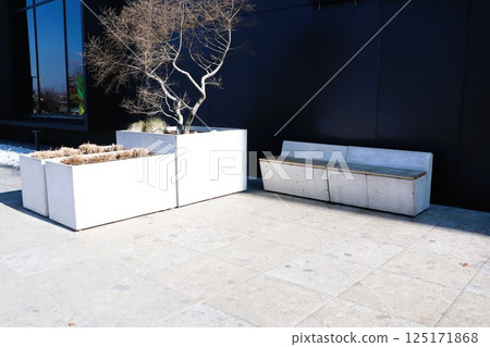 Contemporary Outdoor Seating Areas and Stylish Planters in the Urban Environment of Cities 125171868