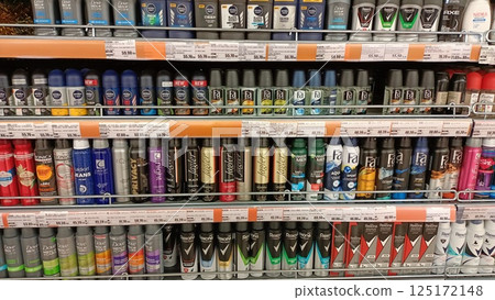 Many different antiperspirants are sold on the shelves in the store Many different antiperspirants are sold on the shelves in the store 125172148