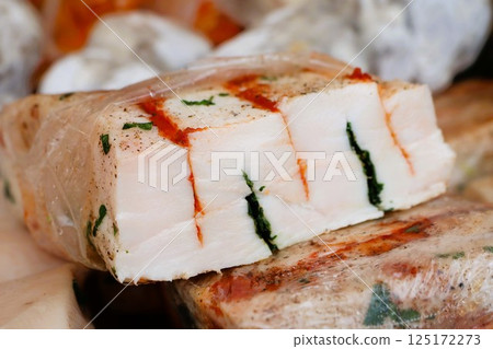 Pork lard with salt and various spices ready to eat at the exhibition of traditional food Pork lard with salt and various spices ready to eat at the exhibition of traditional food 125172273