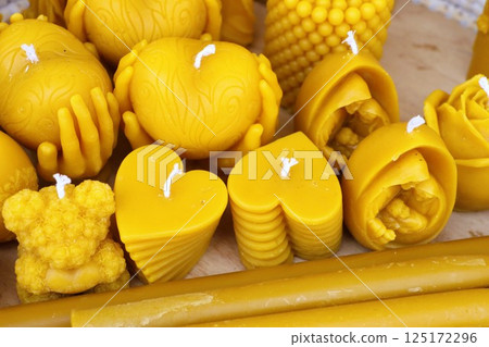 This is a carefully curated collection of Artisan Yellow Beeswax Candles that enhance any space 125172296