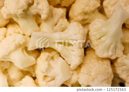 Freshly Cut Cauliflower Pieces Awaiting Your Imaginative Culinary Creations and Dishes Freshly Cut Cauliflower Pieces Awaiting Your Imaginative Culinary Creations and Dishes 125172563
