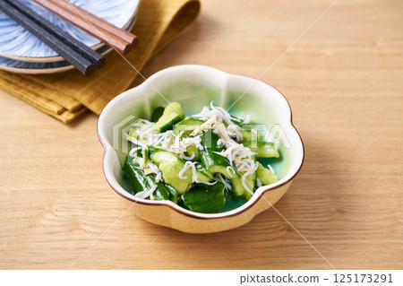 Cucumber and whitebait dressed in sweet vinegar 125173291