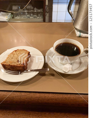 Black coffee and sweets 125173457