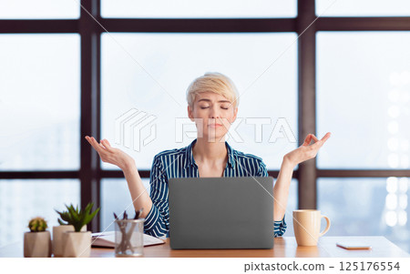 Meditation At Work. Peaceful Businesswoman Relaxing Meditating Sitting At Workplace In Modern Office. Selective Focus 125176554