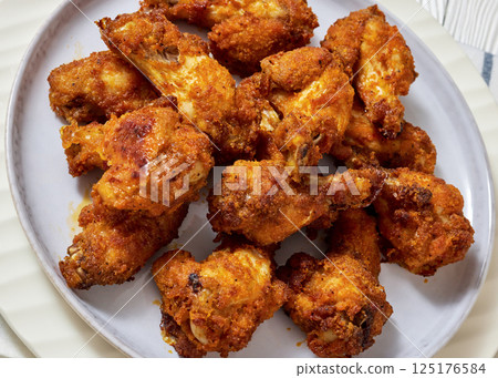 crispy fried chicken wings on a plate crispy fried chicken wings on a plate 125176584