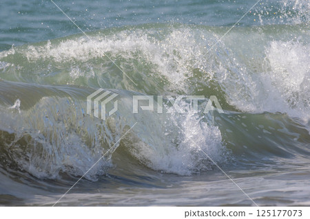 Surging waves Surging waves 125177073