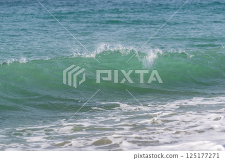 Surging waves Surging waves 125177271