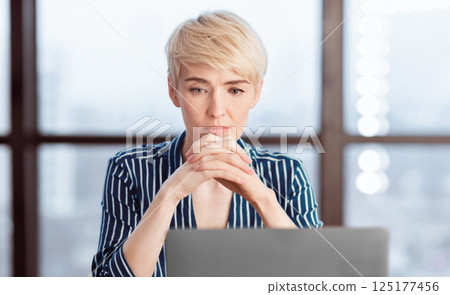 Office Work. Thoughtful Business Lady Thinking Working On Laptop Computer At Workplace. Selective Focus 125177456