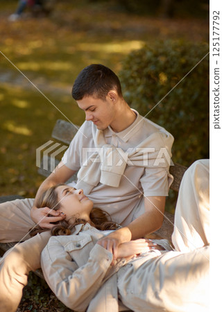 Young Cute Female Hugs Boyfriend. In Autumn Outdoor. Lovers Walking in Park. Attractive Funny Couple. Lovestory in Forest. Man and Woman. Cute Lovers in the Park. Family Concept. Happy Couple. Young Cute Female Hugs Boyfriend. In Autumn Outdoor. Lovers Walking in Park. Attractive Funny Couple. Lovestory in Forest. Man and Woman. Cute Lovers in the Park. Family Concept. Happy Couple. 125177792