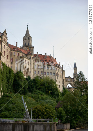 Majestic Sigmaringen Castle Perched on Rugged Cliff Above Tranquil Danube: Historic Hohenzollern Residence Showcases Medieval Architecture and Royal Collections in Picturesque Baden-Wurttemberg 125177953