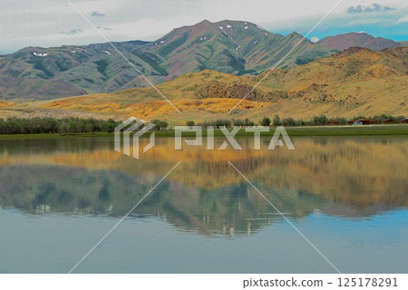 Lake with reflecting mountains, Altai Mountains 125178291