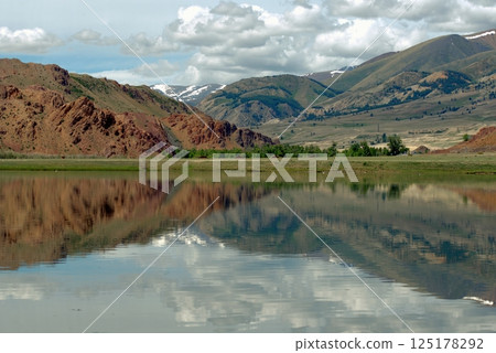 Lake with reflecting mountains, Altai Mountains 125178292