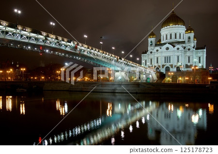Cathedral and Bridge Reflected in River at Night Cathedral and Bridge Reflected in River at Night 125178723