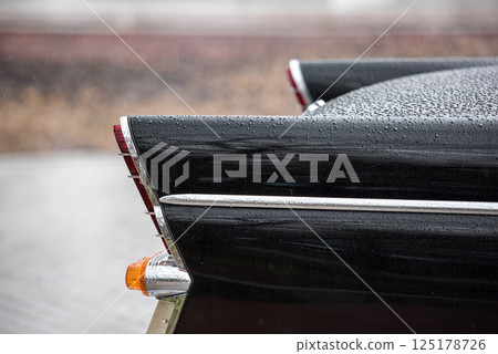 Vintage Car Fins and Tail Lights in Rainy Weather 125178726