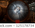 Inside View of a Large Gas Pipeline in Industrial Workshop 125178734