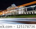 Illuminated Historic Building with Light Trails at Night 125178736