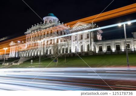 Illuminated Historic Building with Light Trails at Night Illuminated Historic Building with Light Trails at Night 125178736