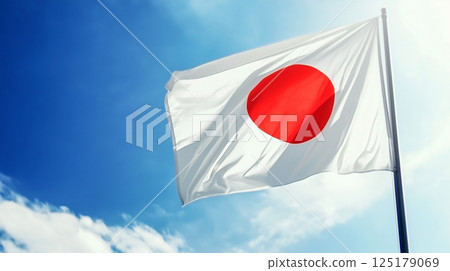 Japan flag waving against a clear blue sky 125179069
