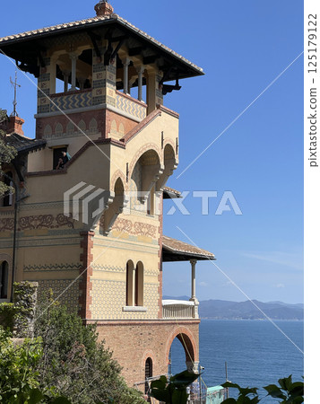 Portofino, Italy - 07 April 2025. Traditional buildings. Sea and tourism. Background for design. 125179122