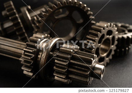 Gear and cogs wheels, clock mechanism, brass metal engine industrial. Gear and cogs wheels, clock mechanism, brass metal engine industrial. 125179827