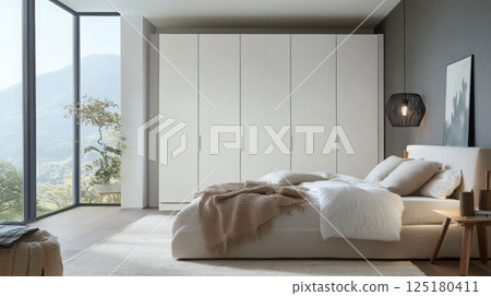 This contemporary bedroom features a cozy bed dressed in soft linens, surrounded by a neutral color palette. Large windows provide abundant natural light and stunning views of the mountains outside. This contemporary bedroom features a cozy bed dressed in soft linens, surrounded by a neutral color palette. Large windows provide abundant natural light and stunning views of the mountains outside. 125180411
