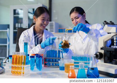 Glass vial, pipette and scientist in laboratory for medical study, research or experiment. Test tube, dropper and professional person with chemical liquid for pharmaceutical innovation. 125181007