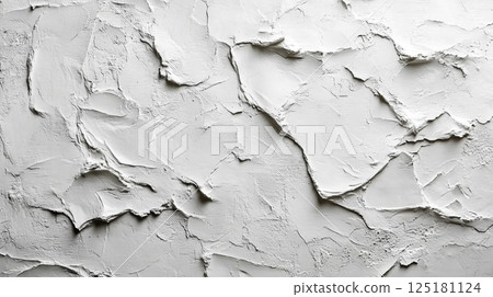 A textured wall displays a series of irregular patterns, highlighting an artistic approach to interior design with a clean white finish, ideal for contemporary spaces. A textured wall displays a series of irregular patterns, highlighting an artistic approach to interior design with a clean white finish, ideal for contemporary spaces. 125181124