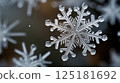 snowflake close up background, christmas time and frosty winter atmosphere, copy space 125181692