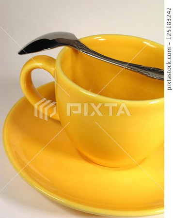 A cup of coffee on a table close view background 125183242