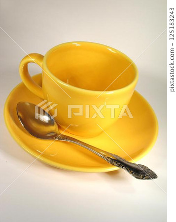 A cup of coffee on a table close view background 125183243