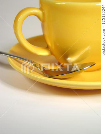 A cup of coffee on a table close view background 125183244