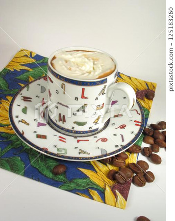 A cup of coffee on a table close view background 125183260