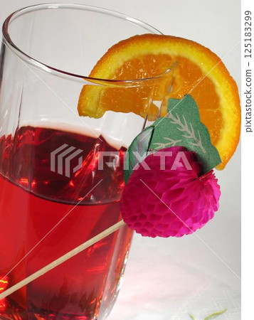 Grape juice in a transparent glass Grape juice in a transparent glass 125183299