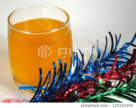 Orange juice close view background Orange juice close view background 125183304