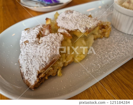 Tasty Cake Dessert On A White Plate Close View Background Tasty Cake Dessert On A White Plate Close View Background 125184284