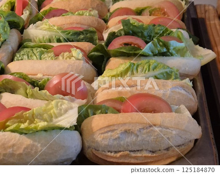 Sandwiches on a tray close view background Sandwiches on a tray close view background 125184870