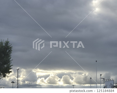 White cumulus clouds in the stormy sky White cumulus clouds in the stormy sky 125184884