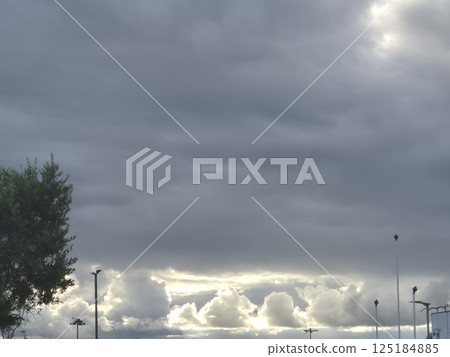 White cumulus clouds in the stormy sky White cumulus clouds in the stormy sky 125184885