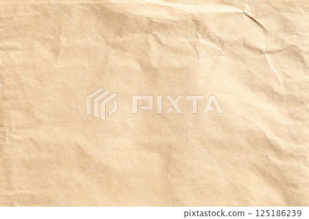 Brown crumpled paper sheet material texture 125186239
