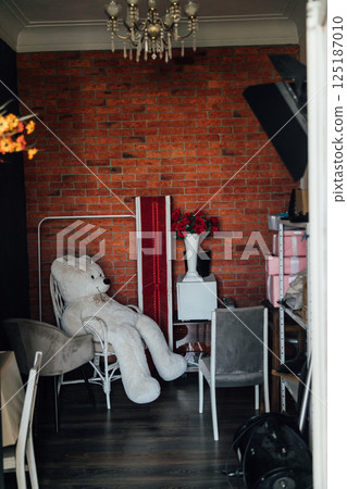 Room interior with a mess of chairs things Room interior with a mess of chairs things 125187010