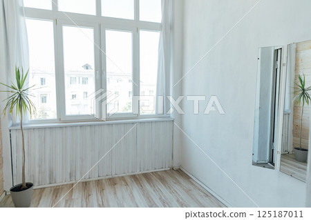 Interior of an wooden veranda with windows Interior of an wooden veranda with windows 125187011