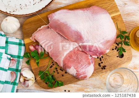 Raw slice pork secret and parsley, special butcher cut 125187438