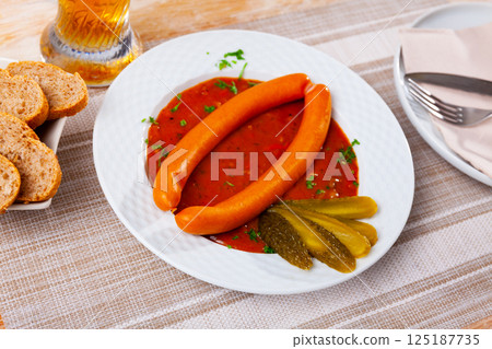 Wiener sausages with goulash sauce Wiener sausages with goulash sauce 125187735