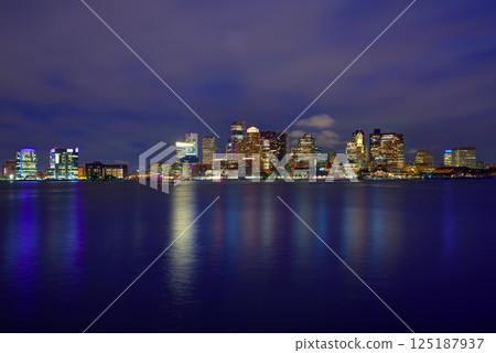 Boston skyline at sunset and river in Massachusetts Boston skyline at sunset and river in Massachusetts 125187937