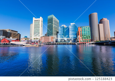 Boston skyline from Fan Pier sunlight Massachusetts 125188423