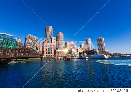Boston skyline from Fan Pier sunlight Massachusetts 125188426