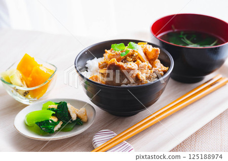Pork and rice bowl with soup 125188974