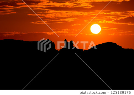 Sunset on US 163 Scenic road to Monument Valley Park 125189176