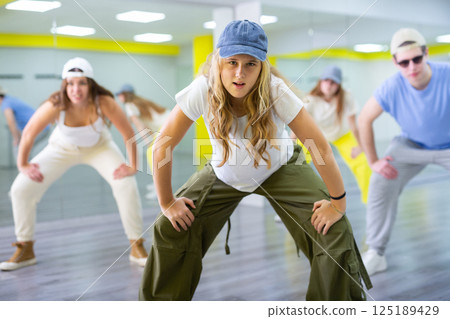 Dance class for teenages, girl and boy training in dance studio Dance class for teenages, girl and boy training in dance studio 125189429